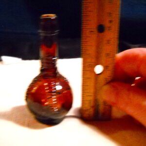 Unknown Talon Claw PURPLE bottle 3-1/2" tall